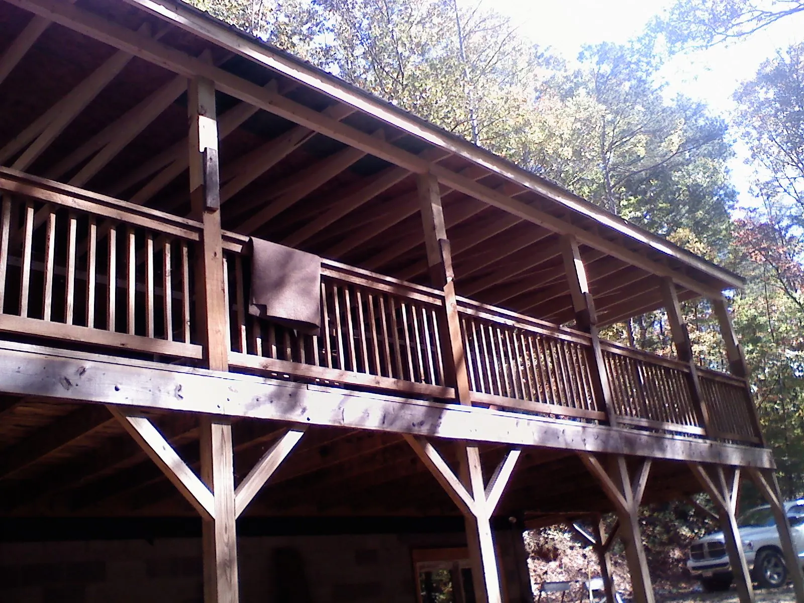 Timber framing under a new elevated porch and deck — Roof Leak Repair in Stockett by Roofing Brothers